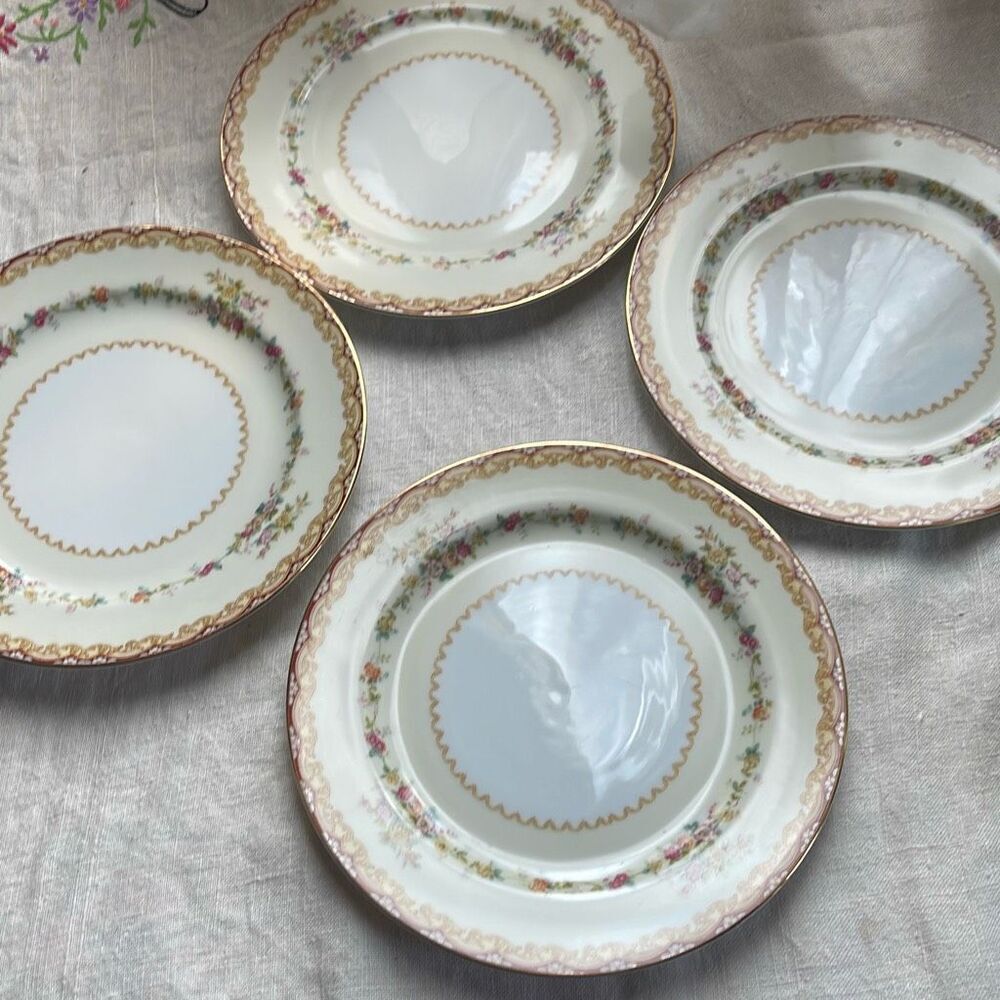 Lot of 4 Noritake China Dimity pattern salad plates.